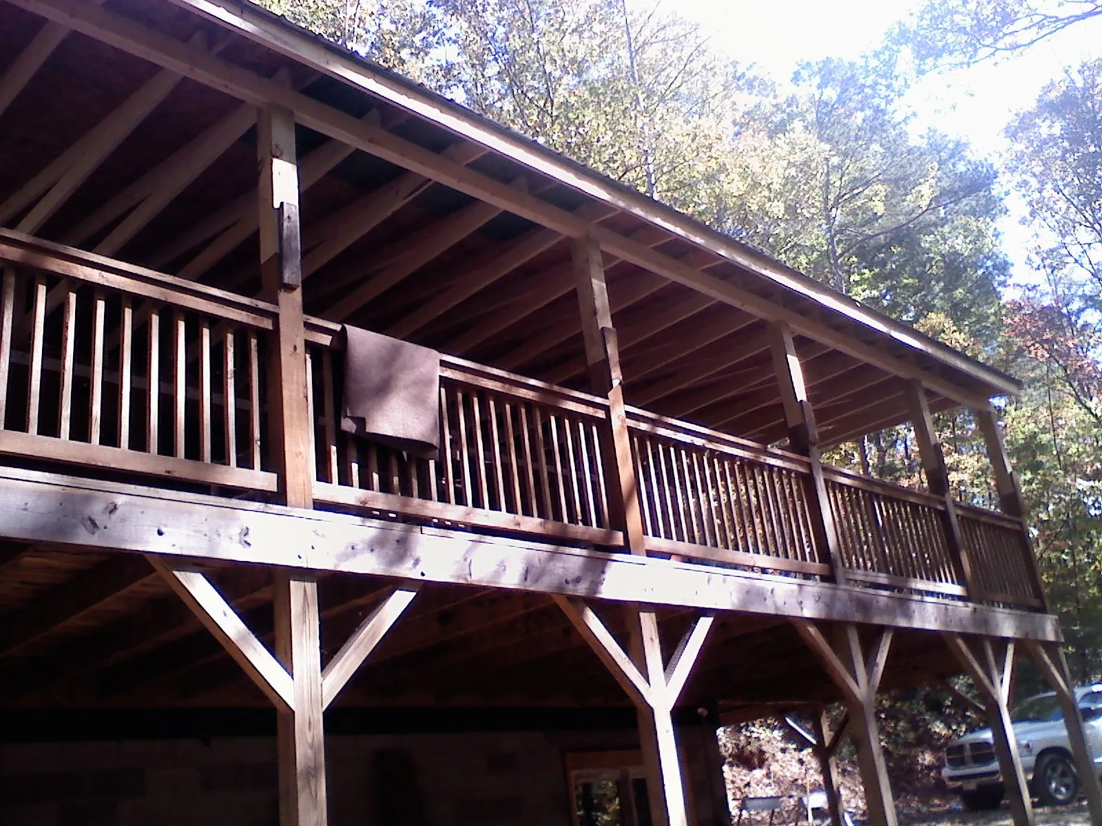 Timber framing under a new elevated porch and deck — Roof Leak Repair in Old Town by Roofing Brothers